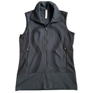 RARE UNICORN, BLACK LULULEMON STRIDE VEST, 6. REFLECTIVE DOVE DECALS ON BACK